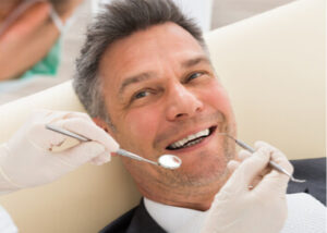 dentures vs implants at Sydney