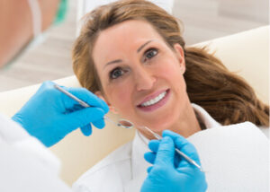 dentures vs implants in Sydney