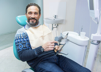 options dental bridge vs implant sydney