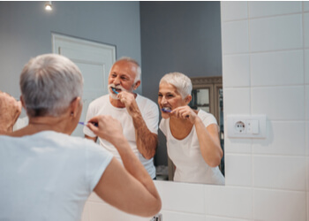 proper care how long do teeth implants last sydney