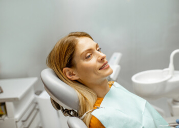replacement options bridge or implant for front tooth sydney