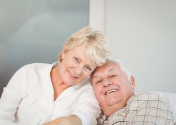choosing teeth implants vs dentures sydney