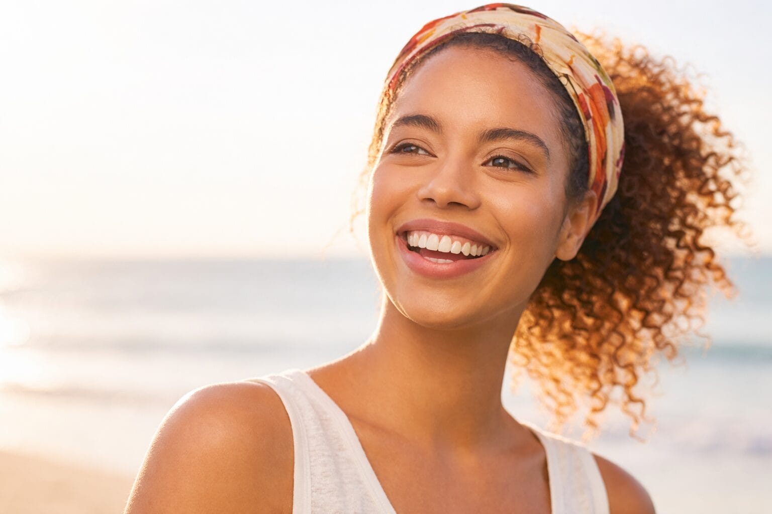 woman smiling sunset